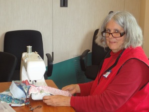 Janet is busy sewing up her 1600" jelly roll quilt from Heirloom Creations